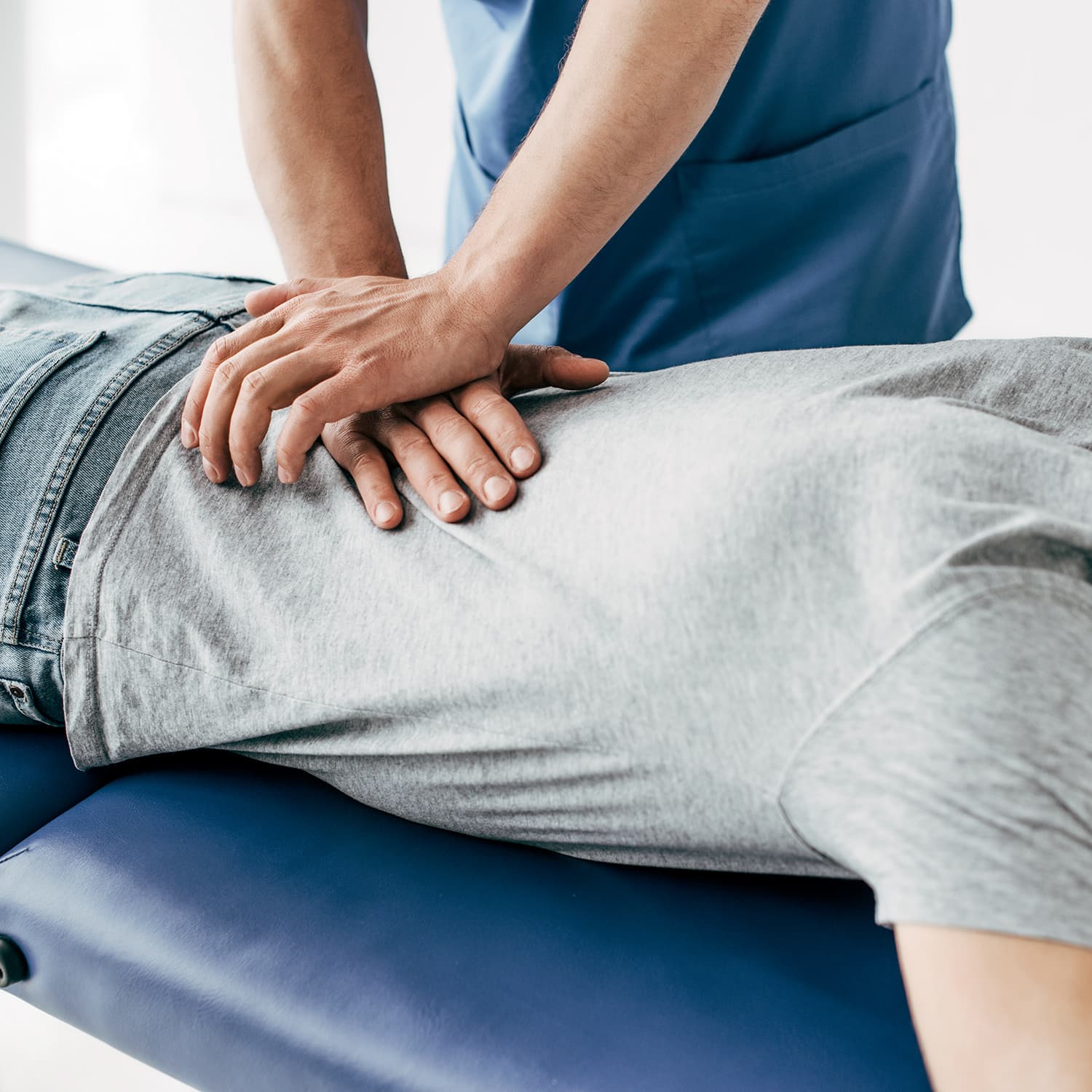 Chiropractor performing spinal adjustment — conservative care vs spine surgery, Forest Hills Queens NY